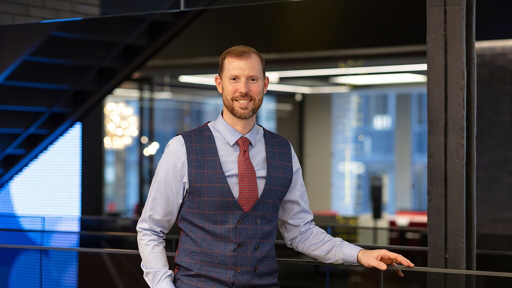 A person in a suit and tie.