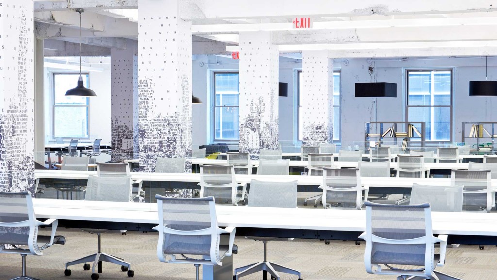 A room with tables and chairs.