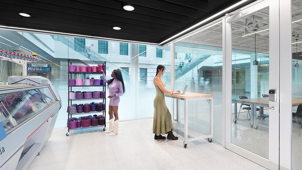 A woman and a man in a store.