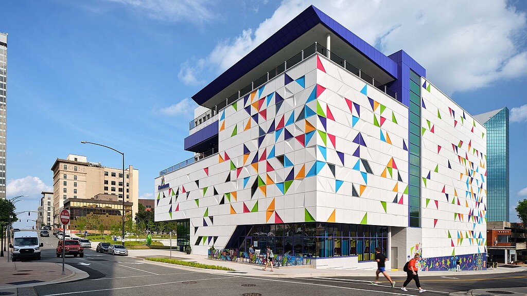 A building with a large mural on it.