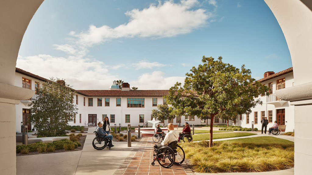 A group of people riding bikes.