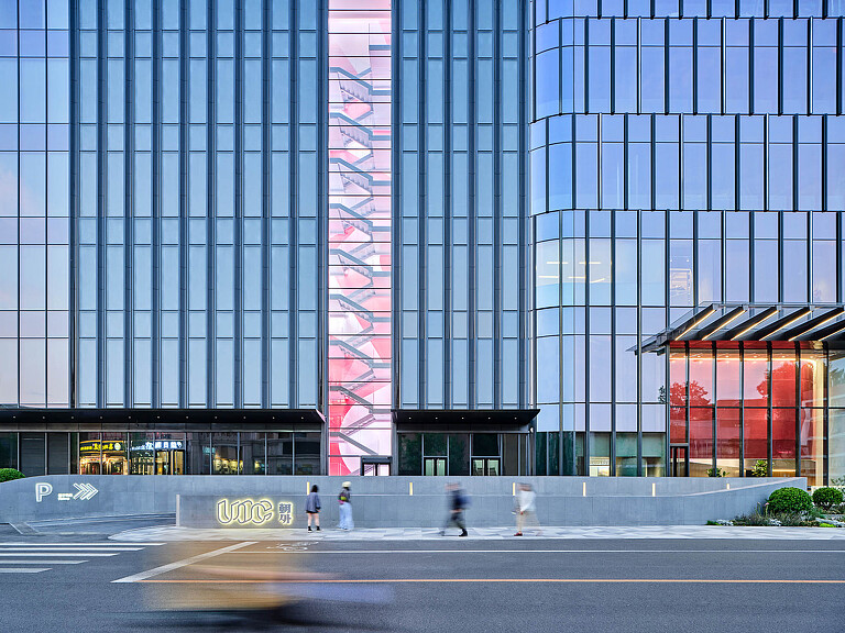 Kuntai Headquarters building exterior with visible interior stairwell