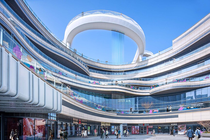 A large building with a curved roof.