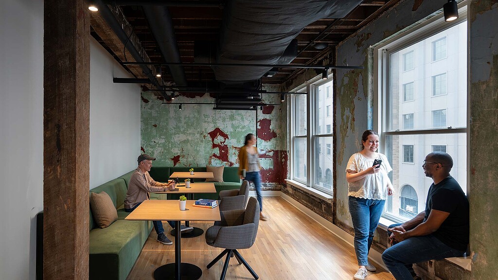 A group of people in a room.