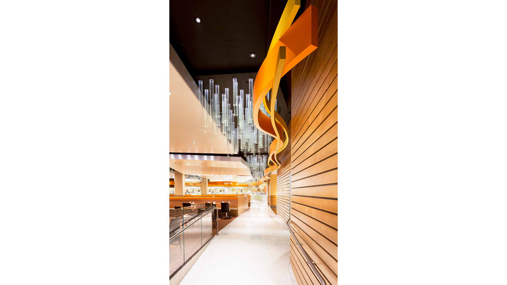 A long hallway with a railing.