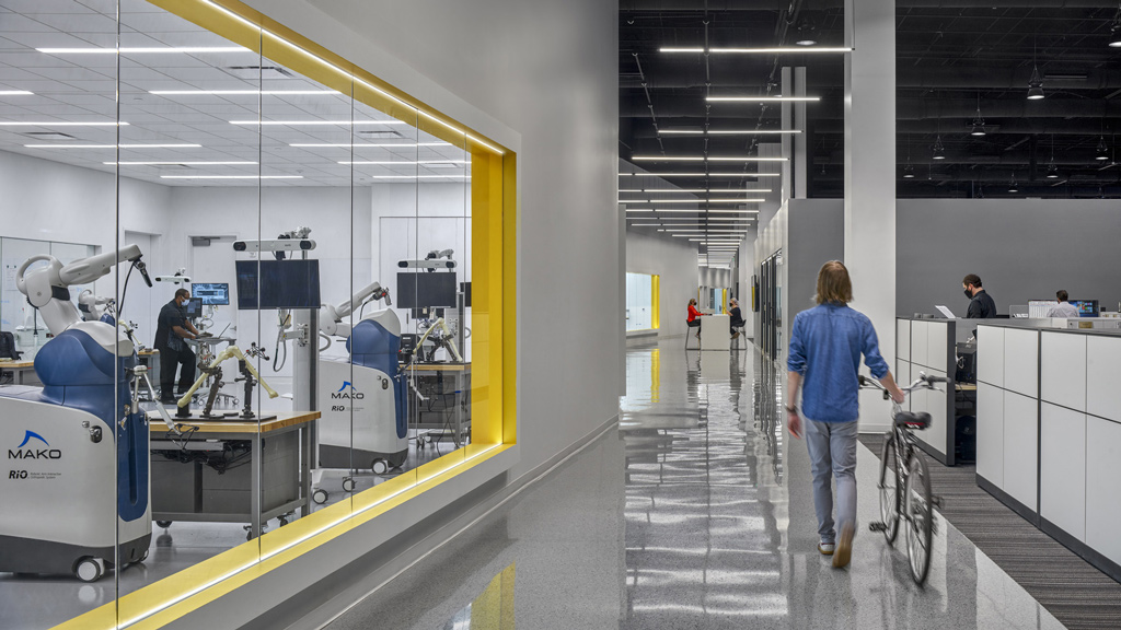 A person walking in a large room.