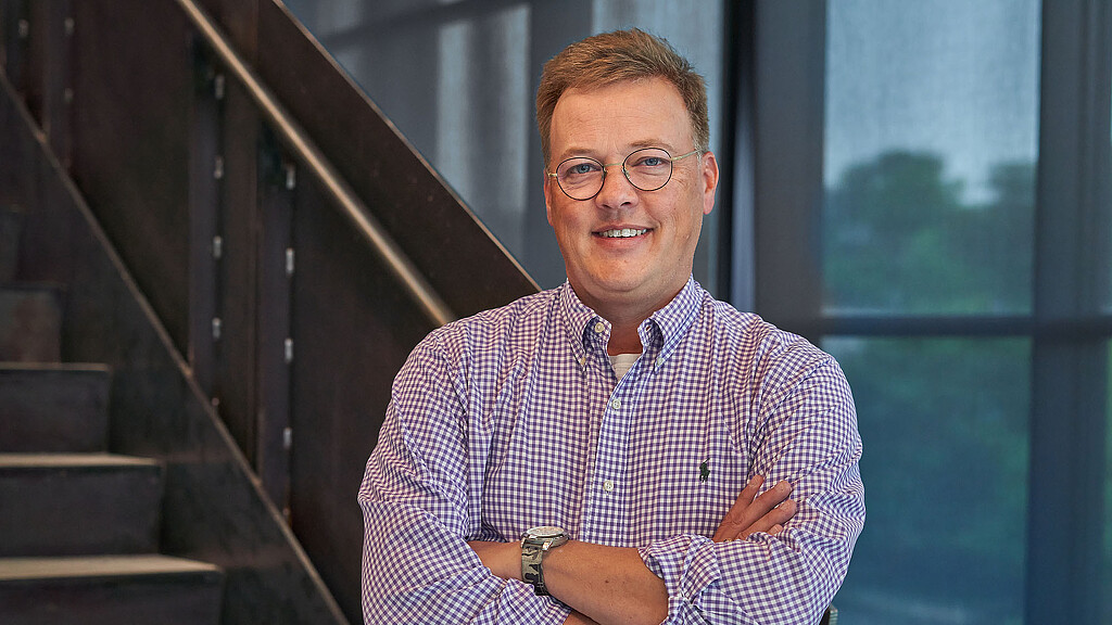 A man with his arms crossed.