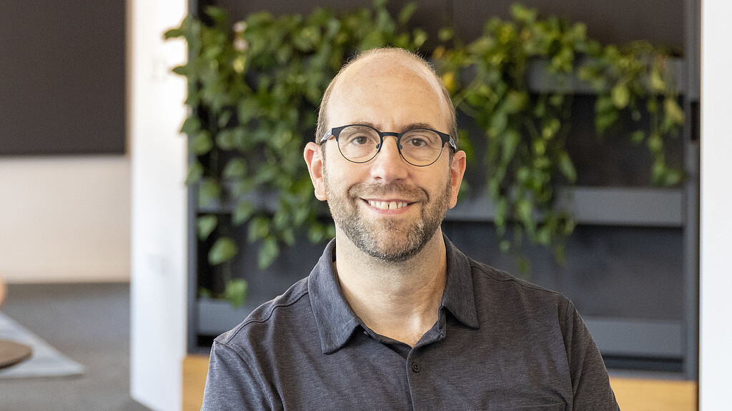 A man wearing glasses.