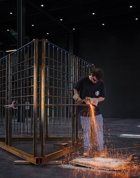 A man standing on a dock.