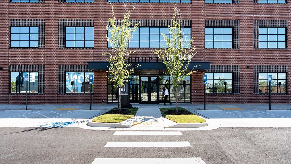 A building with trees in front of it.