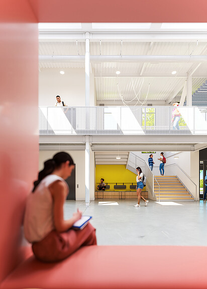 Student studying inside Western Oregon University Student Success Center