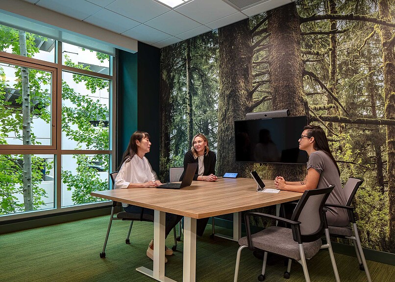 Workday Beaverton meeting space with tree wallpaper