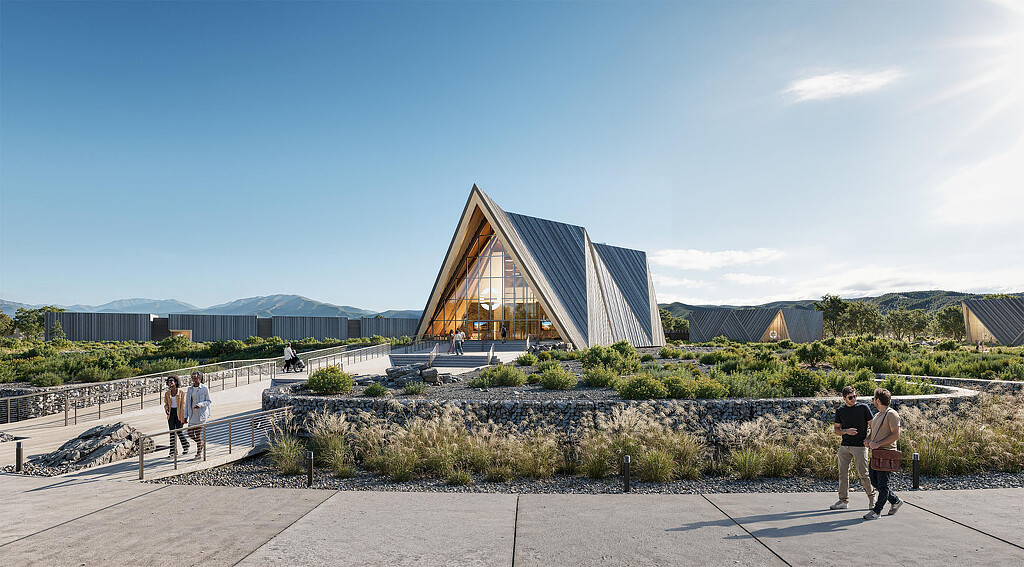 A group of people walking around a building.
