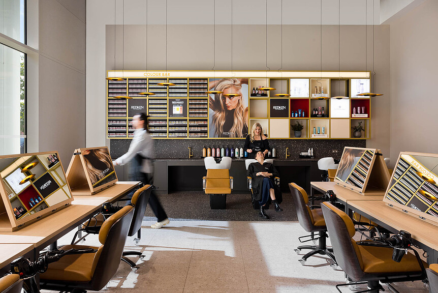 A group of people in a library.