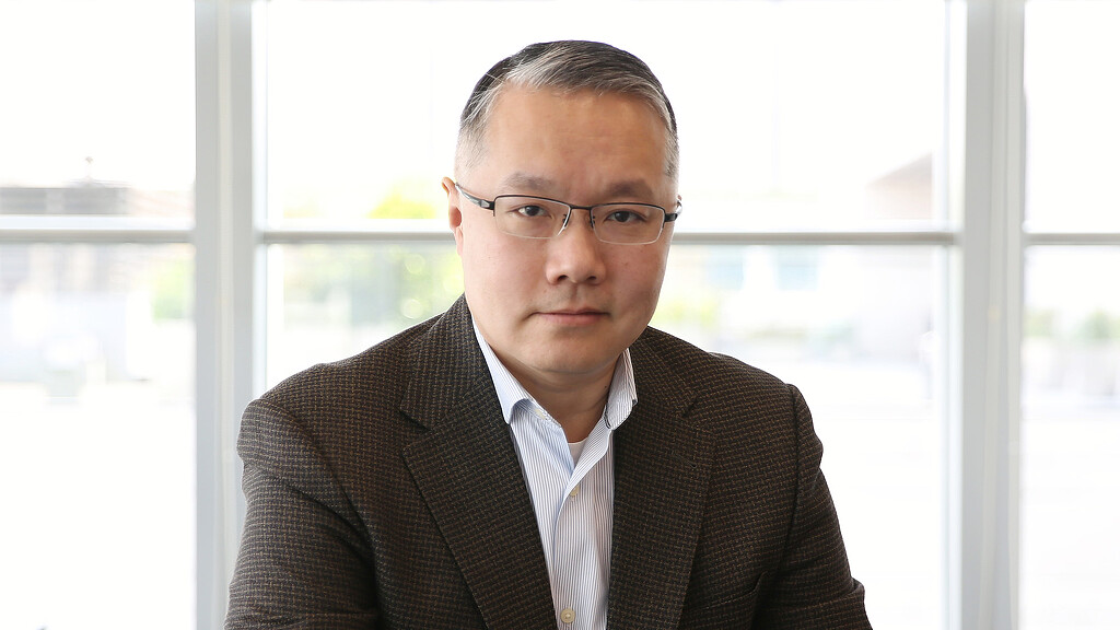 A man wearing glasses.