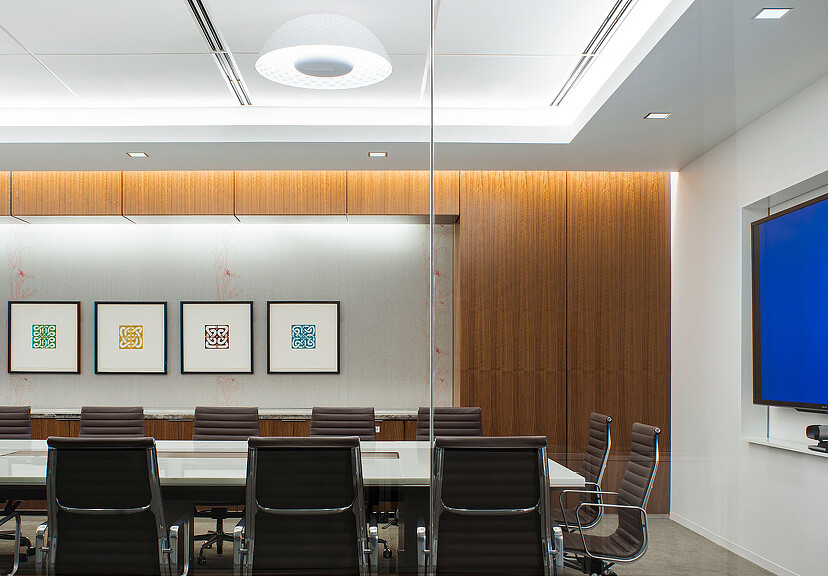 A room with a table and chairs.