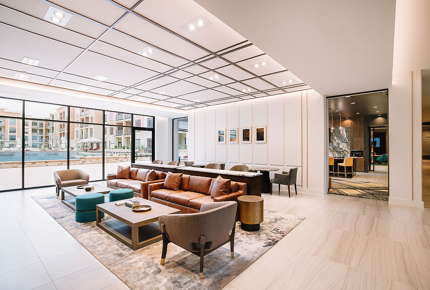 Galleria Residences amenity space with couch and lounge chairs