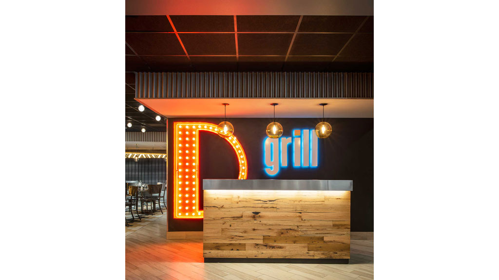 A restaurant with a sign.