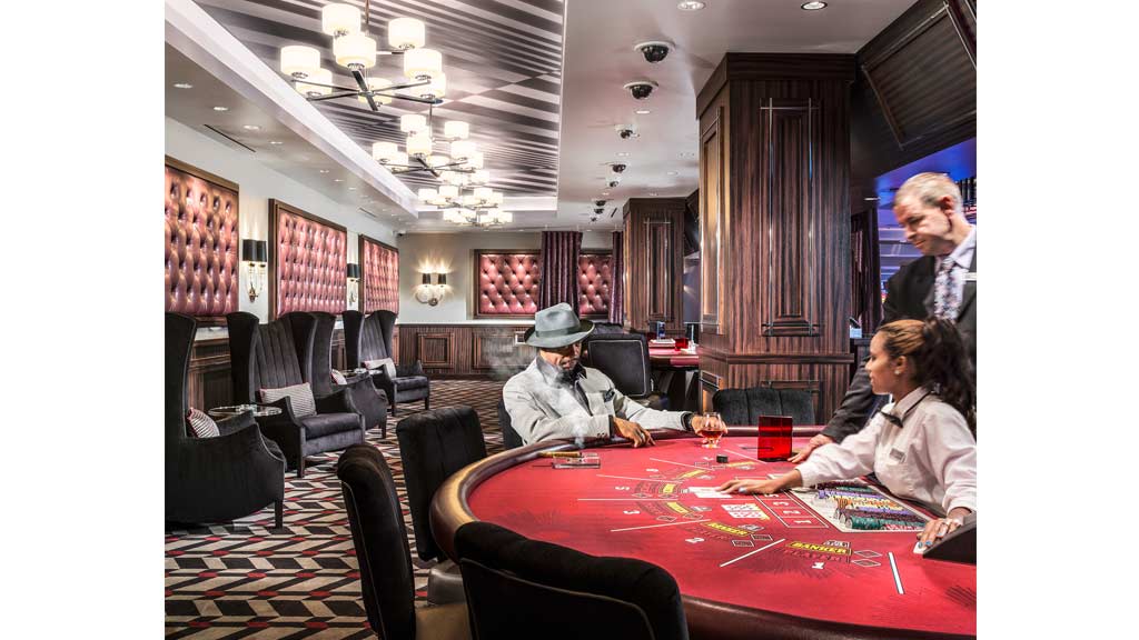 A group of people sitting around a table.