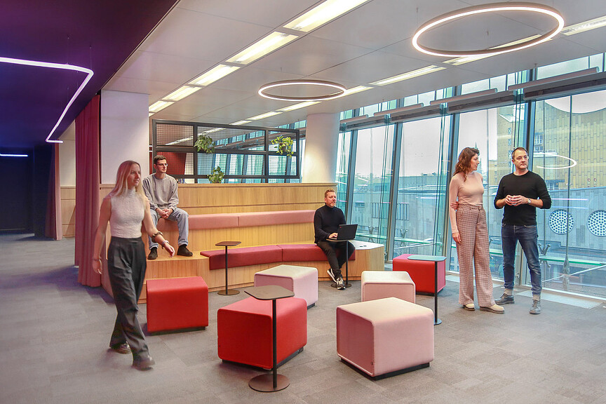 A group of people in a room.