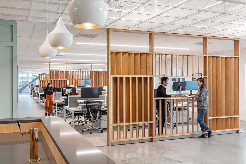 A group of people in an office.