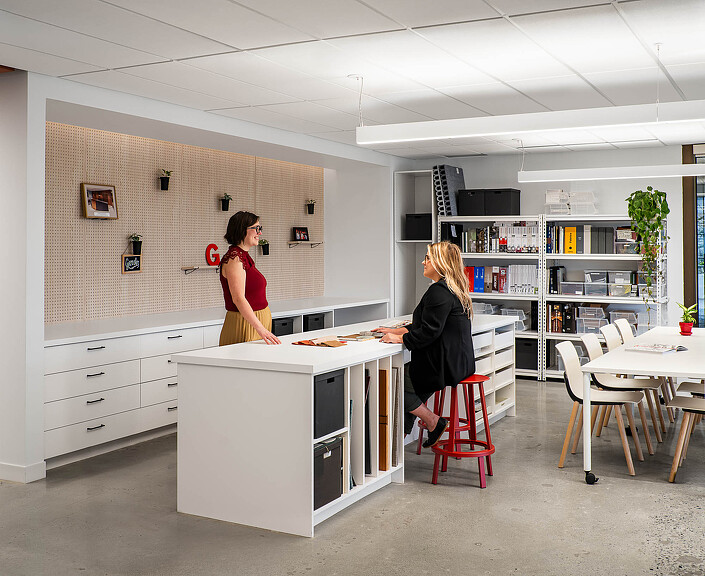 A couple of women in a room.