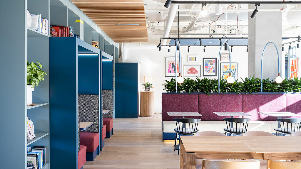 A room with tables and chairs.