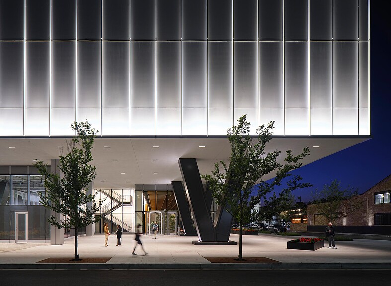 A building with a large glass wall.