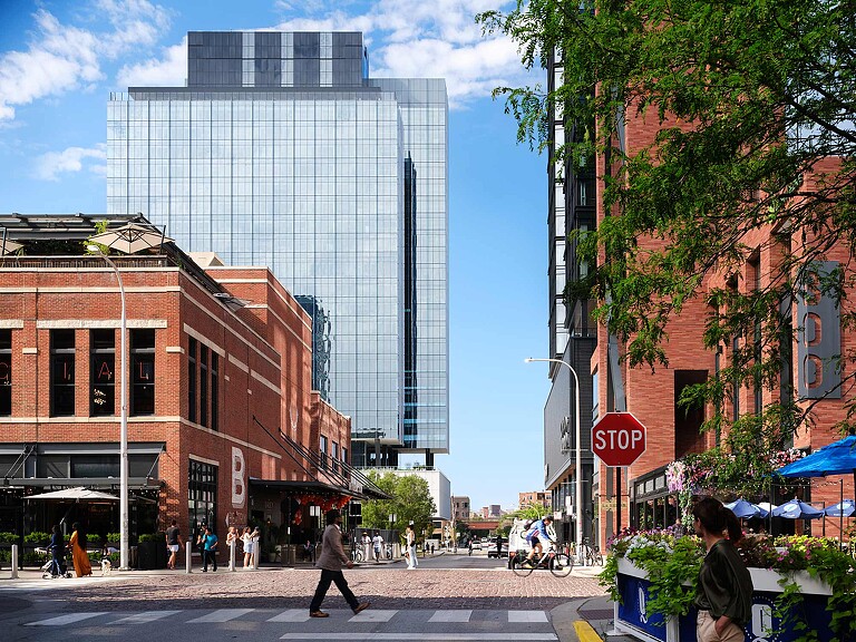 A street with people and buildings.