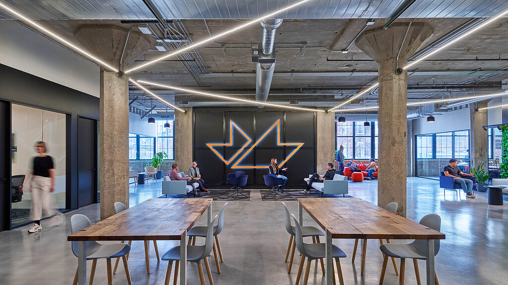 mHUB Chicago interior with wooden tables and varied seating