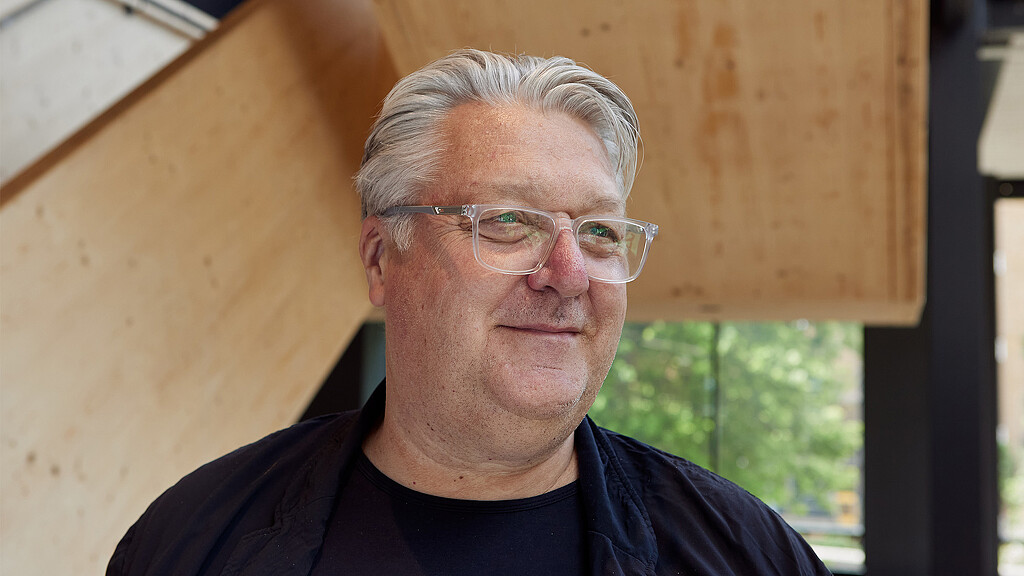 A man wearing glasses.