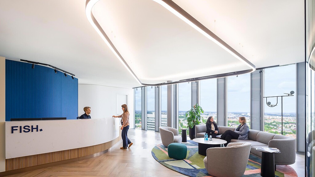 A group of people in a room.