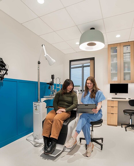 A few women sitting in a room.