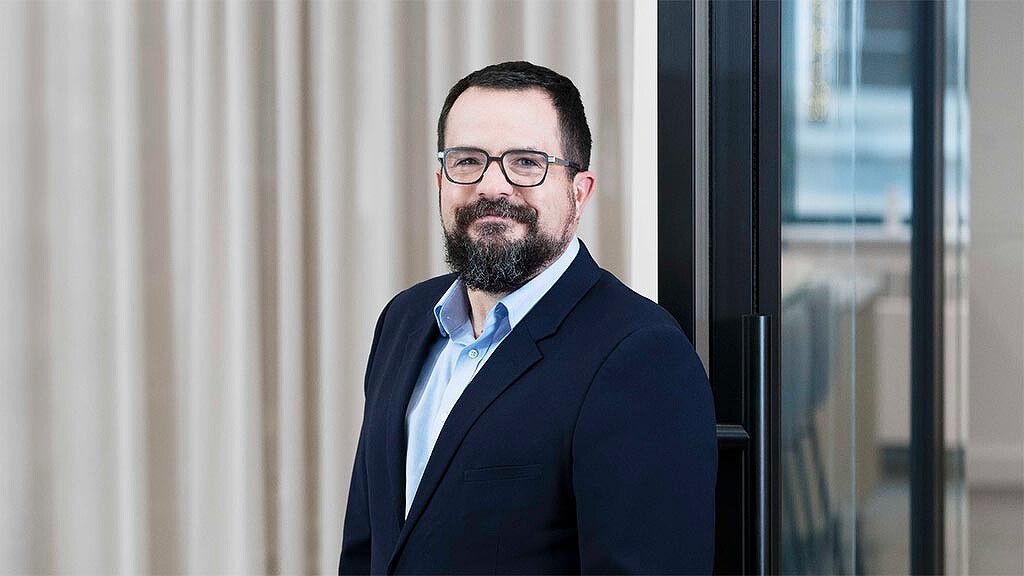 A man wearing glasses.