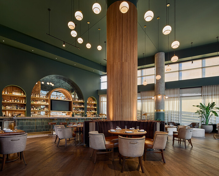 A room with tables and chairs.