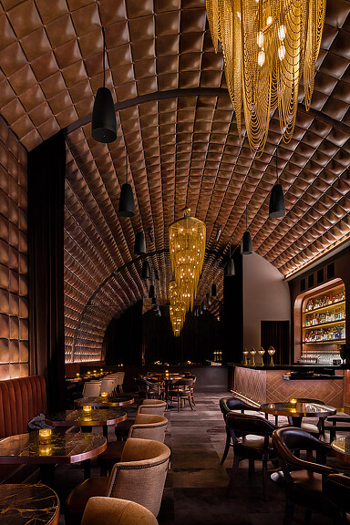 A large room with tables and chairs.