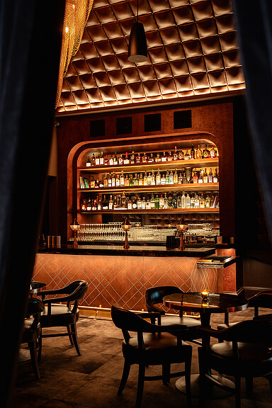 A bar with a large window.