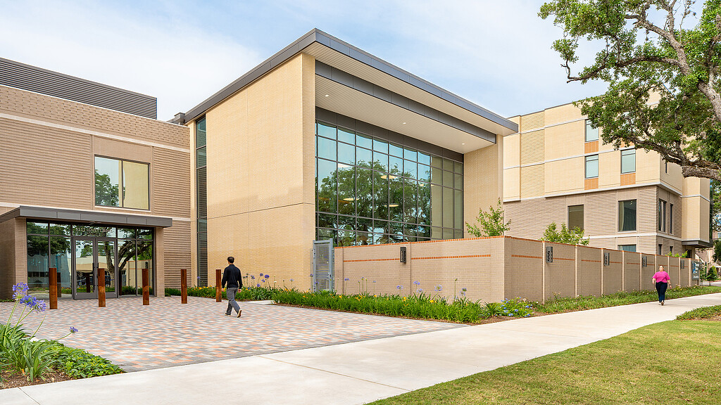 A building with a glass front.