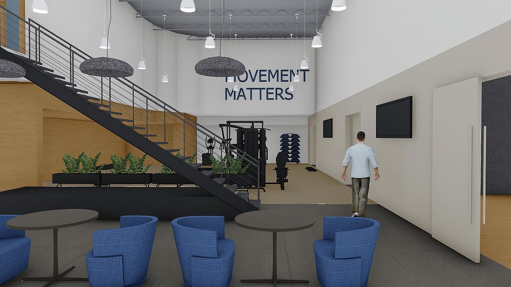 A person walking down a hall.