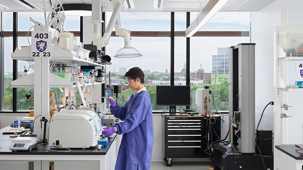A person in a lab coat.
