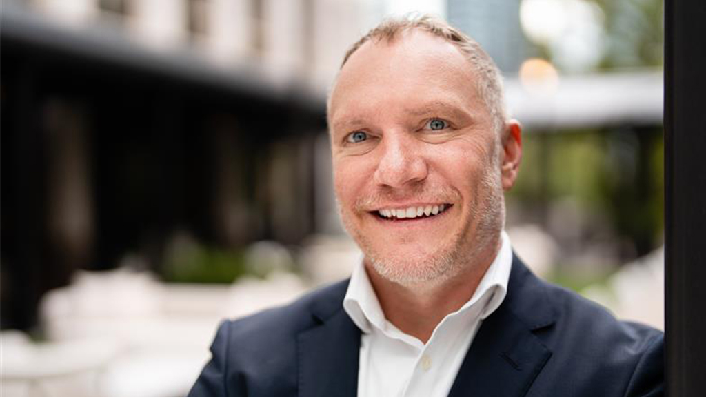 A man smiling for the camera.