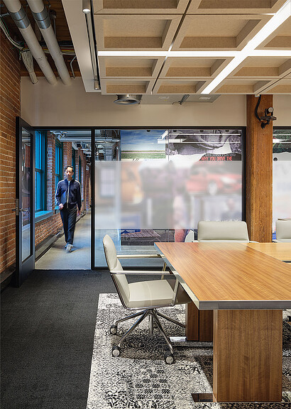 A person walking in a room.