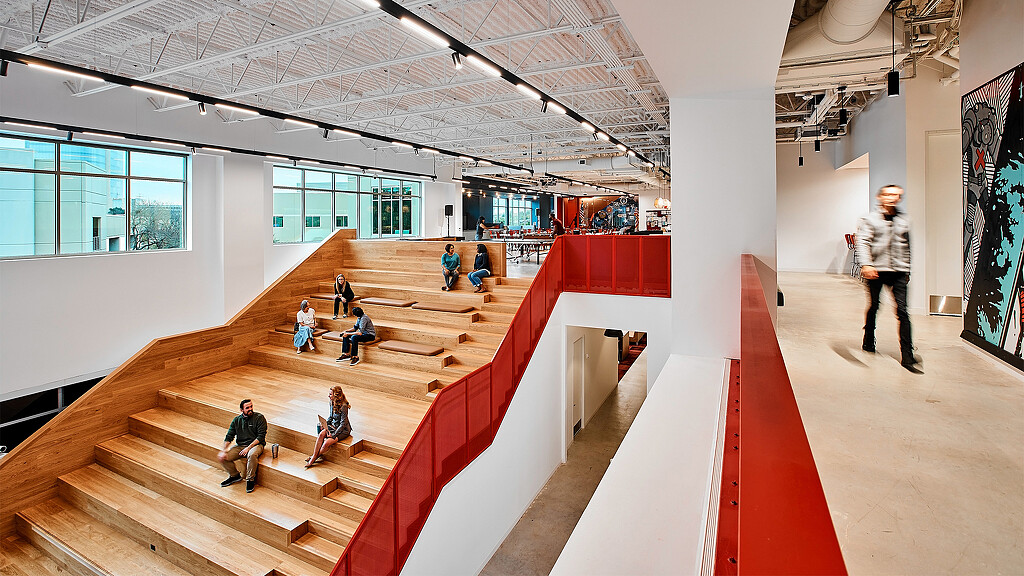 A group of people in a building.