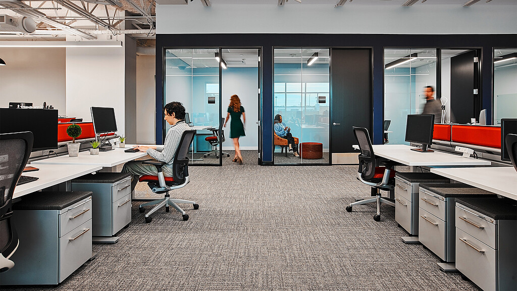 A group of people in an office.