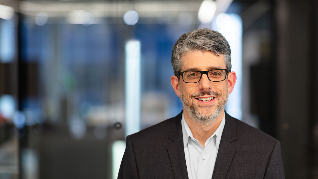 A man wearing glasses.