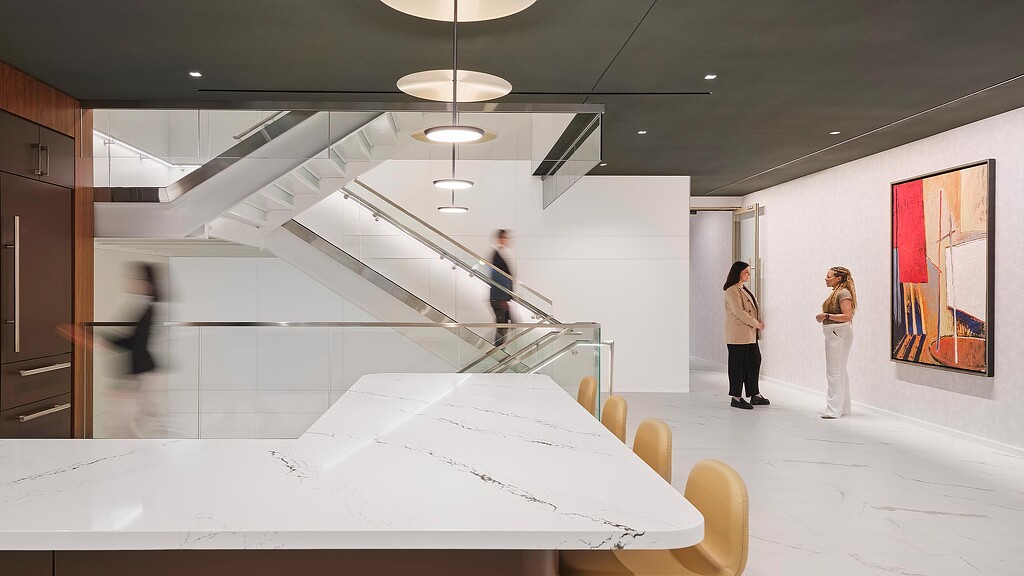 People standing on a staircase.