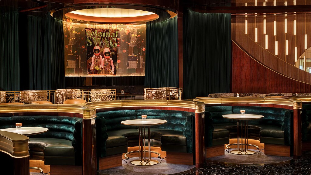 A room with tables and chairs.