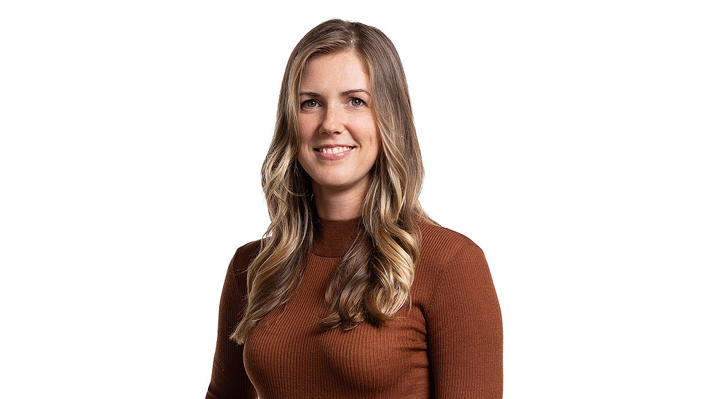 A person smiling for the camera.