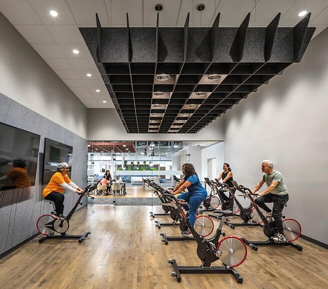 A group of people riding bikes.