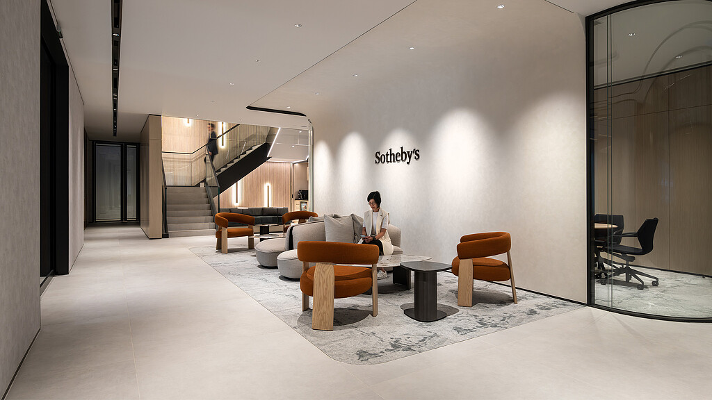 A person sitting in a chair.